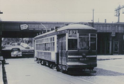 A vintage black and white photograph of a Chicago Surface Lines streetcar on route 67, number 6259, moving along a street under an elevated railroad bridge with an 'Illinois Central West' sign.