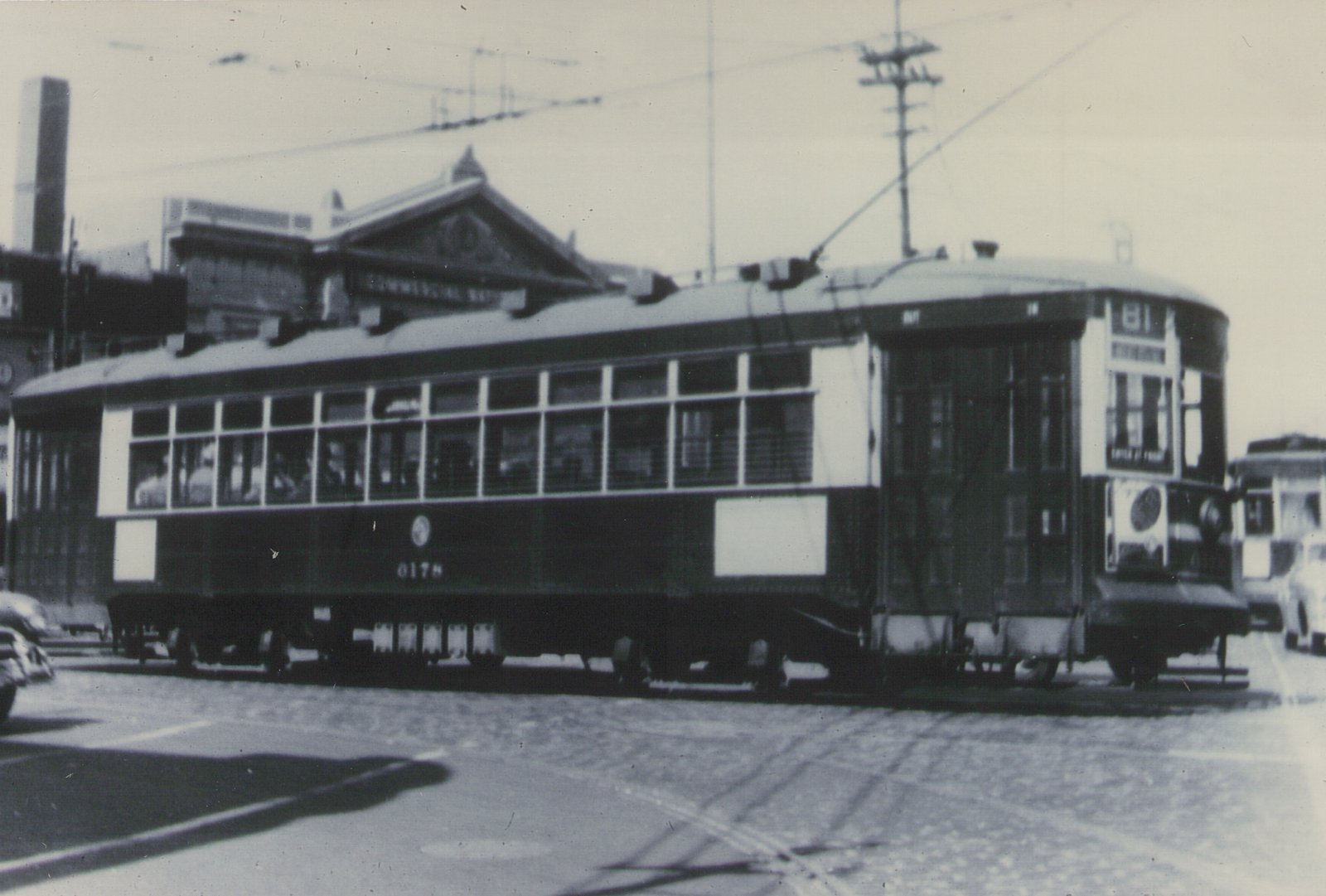 A historic black-and-white photo of a Chicago Surface Lines streetcar numbered 0178 on route 81, running on a city street with overhead wires and a building marked 'COMMERCIAL WEST' in the background.