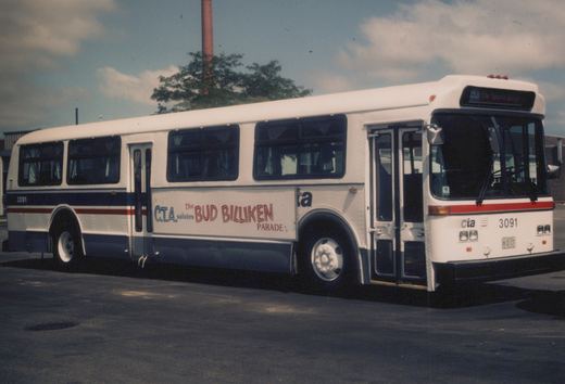 A white and blue Chicago Transit Authority bus, number 3091, with a Bud Billiken Parade ad on its side, parked outdoors on an overcast summer day.