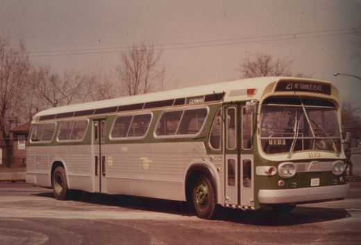 A three-quarter front view of a vintage Chicago Transit Authority motor bus, number 0103, painted green and silver, with a destination sign reading '21 MC CORMICK PLACE' and a side sign reading 'CERMAK'.