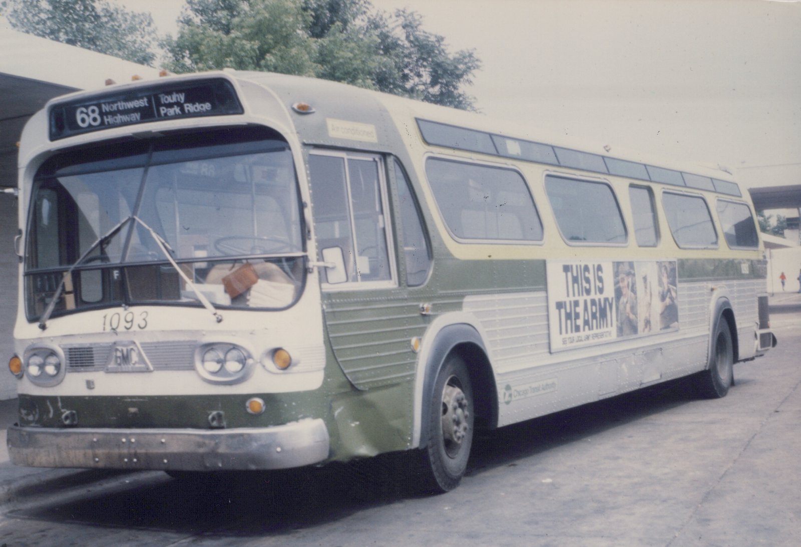 A green and cream Chicago Transit Authority motor bus, number 1093, parked at a street curb with a route sign reading '68 Northwest Highway Touhy Park Ridge' and a side advertisement for 'This is the Army'.