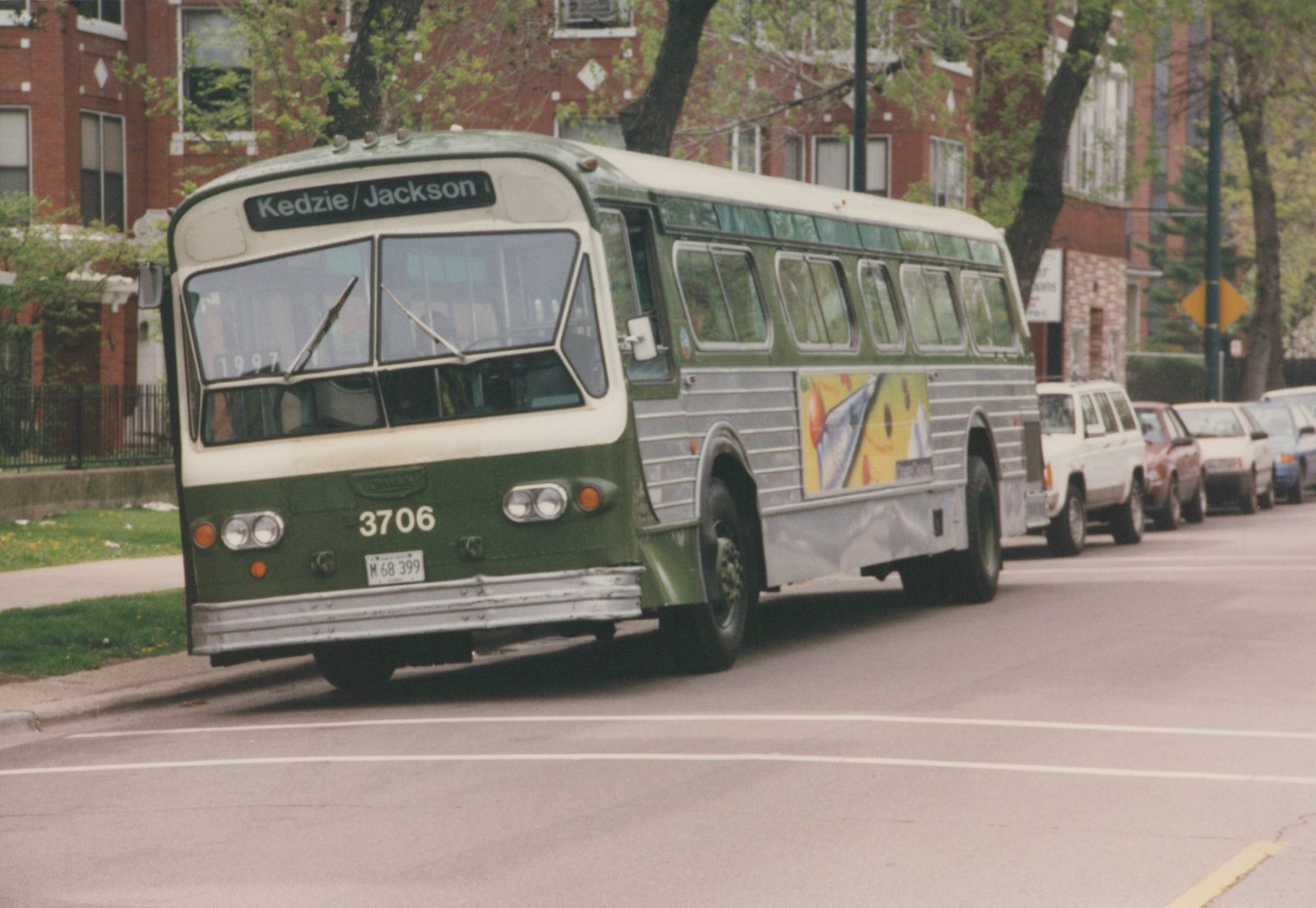 A green and cream CTA bus numbered 3706 with a 'Kedzie/Jackson' sign is on a city street, with background cars from the 1990s.