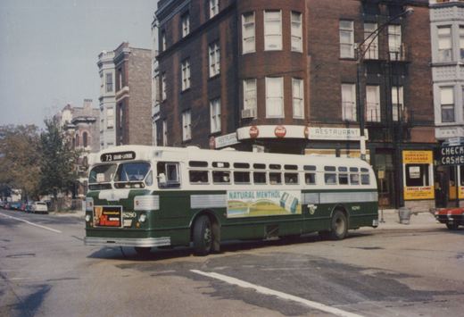 A green and white Chicago Transit Authority motor bus, number 8280, is shown in three-quarter front view on a city street, with a '73 Grand-Latrobe' route sign and a 'Natural Menthol' advertisement on its side.