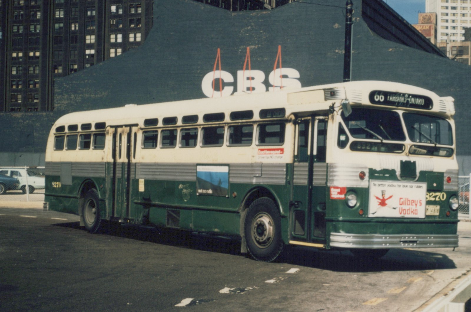 A vintage Chicago Transit Authority bus, number 3270, is shown from a three-quarter front view on a city street, with a large CBS sign on a building behind it.
