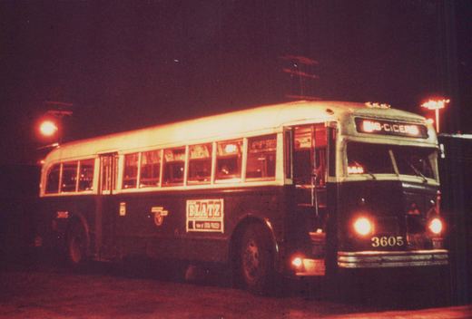 A vintage city bus at night, with its destination sign reading 16-Cicero and fleet number 3605 visible on the side and front.
